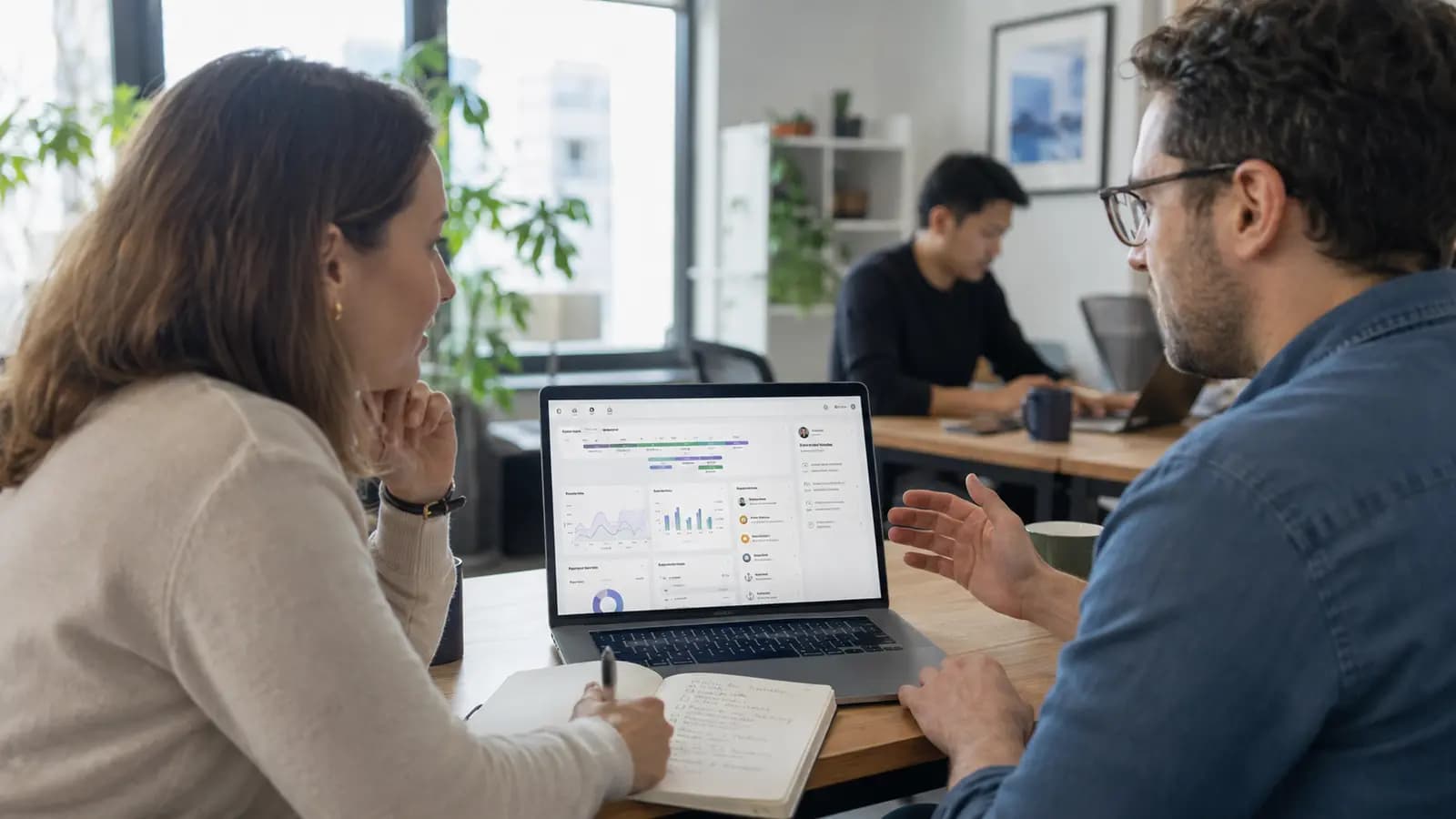 A manager and employee turning integrated work signals into a practical next step